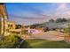 Relaxing pool and patio area with seating and fire pit at 2360 Hardin Ridge Dr, Henderson, NV 89052