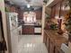 Galley kitchen with wood cabinets and appliances at 3805 Rolling Cloud Dr, Las Vegas, NV 89115