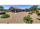 Landscaped backyard with gravel and desert plants at 3906 Jacob Lake Cir, Las Vegas, NV 89118