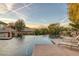 Relaxing pool with lounge chairs and tranquil setting at 6 Caves Valley Ct, Henderson, NV 89052