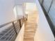 Modern staircase with metal railing and wood accents at 629 Soaring Wings Ave, Las Vegas, NV 89183