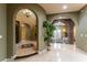 Elegant entryway with high ceilings and decorative flooring at 8223 Windrush Ave, Las Vegas, NV 89117