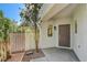 Inviting front entry with a brown door and small patio at 9309 Deer Lodge Ln, Las Vegas, NV 89129