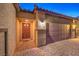 View of the two-car garage and front entry of the home at 10185 Sequoia Falls Pl, Las Vegas, NV 89149