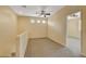 Spacious loft area with carpet and ceiling fan at 1132 Via Fellini, Henderson, NV 89052