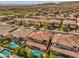 Aerial view of community, featuring a home with private pool at 12048 Portamento Ct, Las Vegas, NV 89138