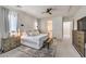 Bright main bedroom with ensuite bathroom access and walk-in closet at 12048 Portamento Ct, Las Vegas, NV 89138