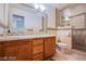 Double vanity bathroom with shower and tile flooring at 1326 Summer Dawn Ave, Henderson, NV 89014