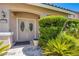 House entrance with double doors and lush landscaping at 1326 Summer Dawn Ave, Henderson, NV 89014