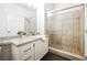 Bathroom with granite countertop and a walk-in shower at 1830 N Buffalo Dr # 1054, Las Vegas, NV 89128