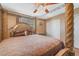 Bedroom with large wooden canopy bed and hardwood floors at 2211 Sleepy Ct, Las Vegas, NV 89106