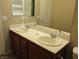 Double sink bathroom vanity with light brown cabinets at 3817 Bella Legato Ave, North Las Vegas, NV 89081