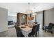 Spacious dining area with a view into the living room at 4385 El Cebra Way, Las Vegas, NV 89121