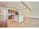 Spacious kitchen with island, stainless steel appliances, and granite countertops at 6093 Crown Palms Ave, Las Vegas, NV 89139