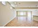 Bright and spacious living room with tile floors and lots of natural light at 6093 Crown Palms Ave, Las Vegas, NV 89139