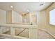 View of an upstairs hallway with access to a bathroom and other rooms at 6093 Crown Palms Ave, Las Vegas, NV 89139