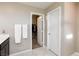 Bathroom with double sinks and a walk-in closet at 7023 Bering Strait Ave, Las Vegas, NV 89179