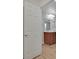 Bathroom with double vanity and wood-look floors at 7564 Daniel Boone Ct, Las Vegas, NV 89166