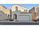 Two story house with attached garage at 7564 Daniel Boone Ct, Las Vegas, NV 89166