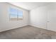 Bright bedroom featuring a large window and neutral decor at 765 Black Palace St, Henderson, NV 89011