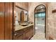 Elegant bathroom with a soaking tub and granite vanity at , Las Vegas, NV 89118