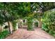 Peaceful courtyard with a brick pathway and lush greenery at , Las Vegas, NV 89118