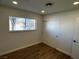 Well-lit bedroom featuring wood floors and a sliding door closet at , Las Vegas, NV 89121