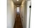 Clean hallway with wood-look floors and built-in storage at , Las Vegas, NV 89121