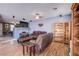 Living room with leather furniture and built-in shelving at 1017 Amber Gate St, Henderson, NV 89002