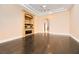 Bright living room with hardwood floors and built-in entertainment center at 1278 Imperia Dr, Henderson, NV 89052