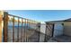 Backyard with gate and concrete patio at 2740 Vita Dr, North Las Vegas, NV 89030