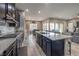 Spacious kitchen with an island and stainless steel appliances at 3428 Isle Dr, Las Vegas, NV 89141