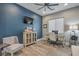 Home office with a desk, chair, and built-in shelving at 3428 Isle Dr, Las Vegas, NV 89141