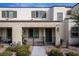 Modern townhouse exterior with a covered patio and landscaped walkway at 3585 Arcadian Sea St, Las Vegas, NV 89106