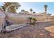 Backyard featuring a small pond and gravel landscaping at 5396 Chestnut St, Las Vegas, NV 89119