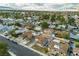 Aerial view of house and surrounding neighborhood, showcasing curb appeal at 5512 Burntwood Way, Las Vegas, NV 89108