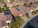 Aerial view of house, yard, and neighborhood with solar panels at 5658 Pleasant Palms St, North Las Vegas, NV 89081