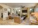 Open living room featuring a ceiling fan and neutral decor at 5658 Pleasant Palms St, North Las Vegas, NV 89081