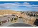 Modern home with solar panels, desert landscaping, and mountain views at 9570 Thistle Creek Ave, Las Vegas, NV 89178