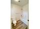 Bathroom with tub and light wood-look vinyl floor at 1605 Calle Montery St, Las Vegas, NV 89117