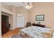 Bright main bedroom, featuring hardwood floors and ample closet space at 1704 Nestled Meadows Ln, Las Vegas, NV 89128