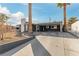 Gray single story house with carport and palm trees at 232 Colleen Dr, Las Vegas, NV 89107