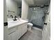 Modern bathroom with white vanity and glass shower at 2825 Westwind Rd, Las Vegas, NV 89146