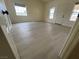 Bright and spacious bedroom with wood-look floors at 2825 Westwind Rd, Las Vegas, NV 89146