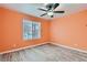 Bedroom with ceiling fan and wood-look tile floors at 5041 Vista Del Rancho Way, North Las Vegas, NV 89031