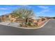 Three-car garage home nestled on a corner lot in a quiet community at 8969 Monte Oro Dr, Las Vegas, NV 89131