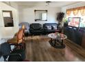 Living room with hardwood floors and comfy seating at 1920 Walnut Ave, Las Vegas, NV 89101