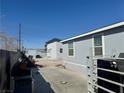 Backyard with gravel area, storage, and BBQ at 320 W Van Buren Ave, Las Vegas, NV 89106