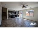 Spacious living room with an open floor plan and lots of natural light at 386 Espressivo St, Henderson, NV 89011