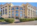 Luxury condo building with manicured landscaping at 29 Montelago Blvd # 201, Henderson, NV 89011